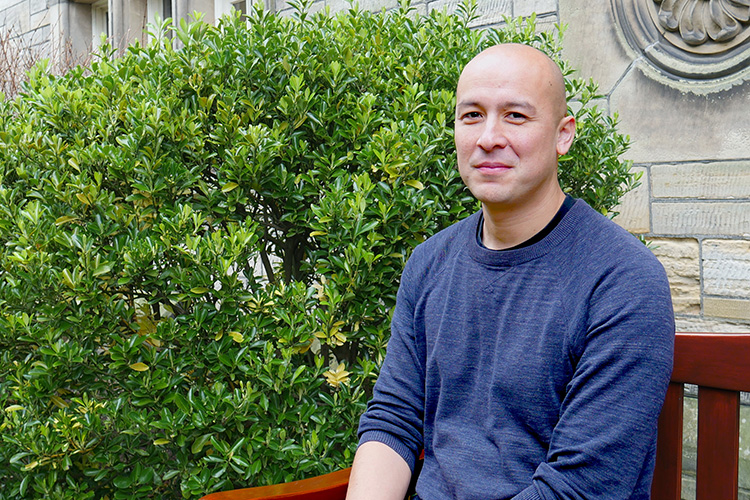 man sitting on bench