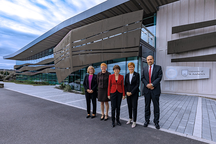 First Minister, Principal and Vincent Janik outside SOI