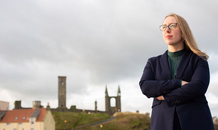 A student on St Andrews pier