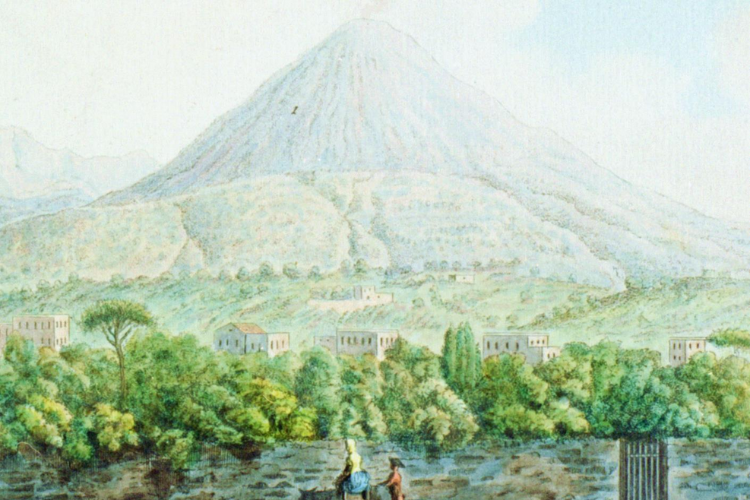 A mountain and two people, one of which is on a horse.