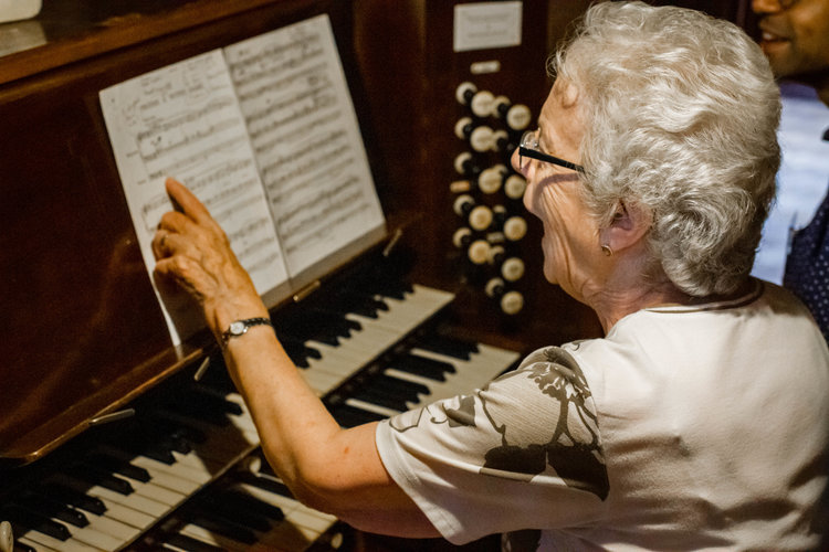 Lady playing the organ