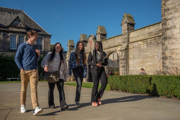 PhD students walking in the Quad