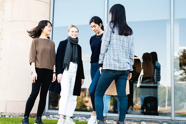 Group of postgraduate students socializing