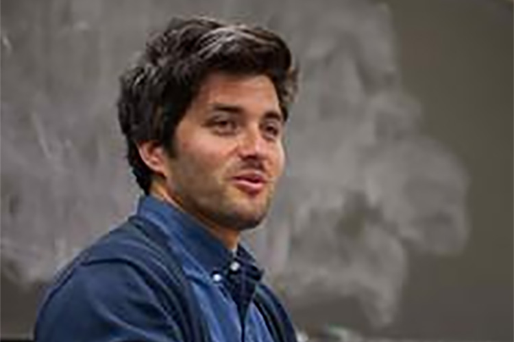 Adam Etison wins teaching award.