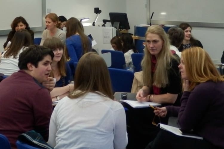 Students discussing work