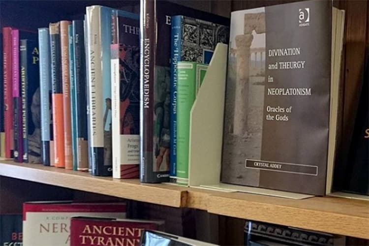 Books written by Classics staff, in a bookcase