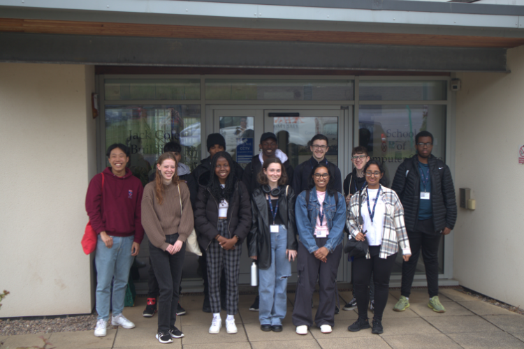 Sutton Trust participants standing at main entrance to Computer science building.
