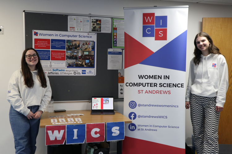 Student's standing at Women in Computer Science stall