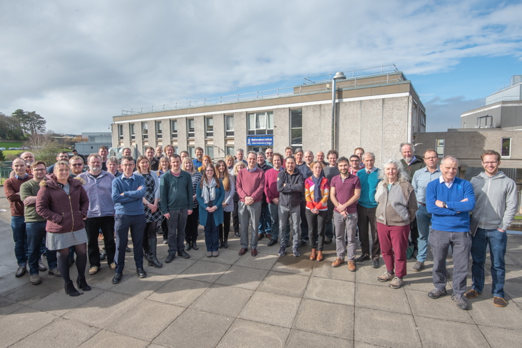 Photo of Maths staff outside Mathemaetical Institute