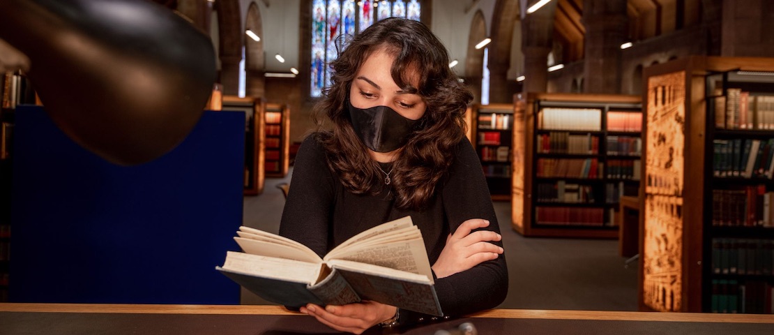 Student reading a book