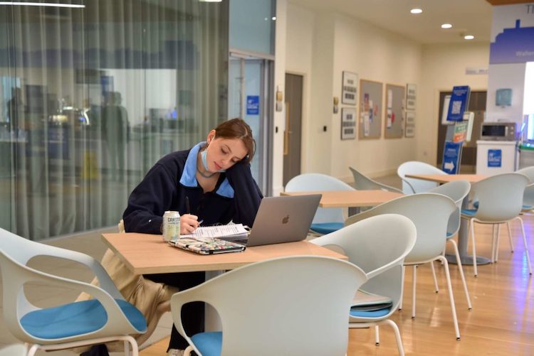 Student studying in the medicine cafe