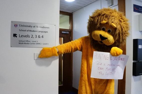 Student in lion constume promoting energy saving