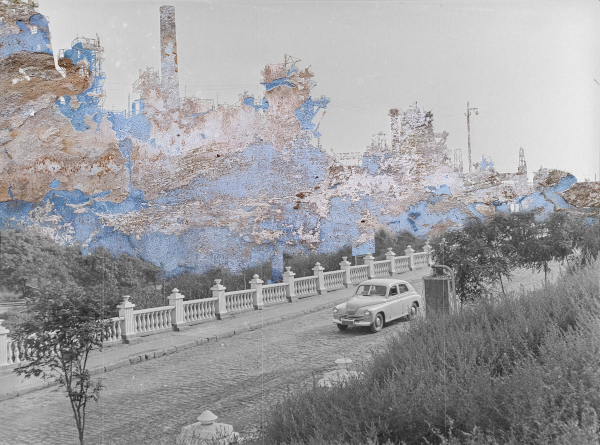 Composite photo - Vintage car against background of industrial landscape