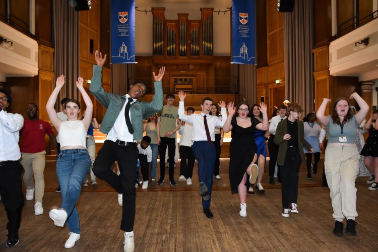 First Chances Fife student group dancing in Younger Hall at the University of St Andrews