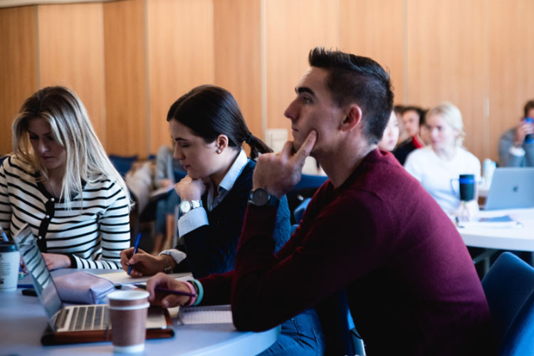 Illustrative photo of students during a seminar at St Andrews.