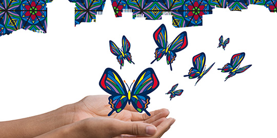 hands opening with butterflies