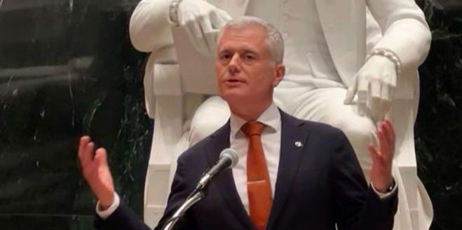Mark Clampin, delivering a speech at a podium. His arms are raised in expression as he speaks Mark Clampin, delivering a speech at a podium. His arms are raised in expression as he speaks