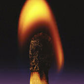 A burning match