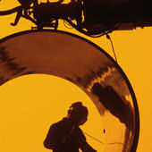 Worker inside a pipe